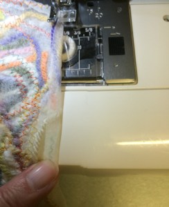 6 Catch any loose ends by folding over the edge and stitching down. 